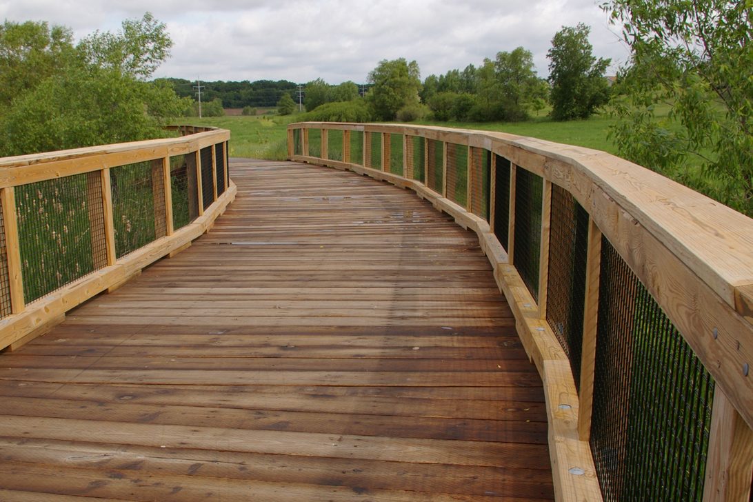 A bridge built with pt hem-fir that curves slightly to the left.