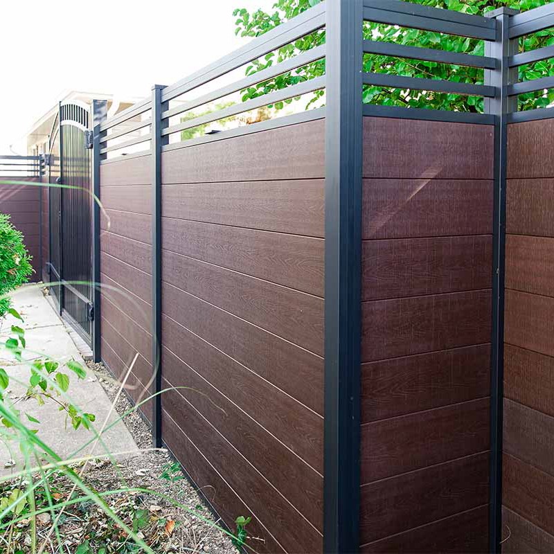 Classic Trellis composite fence in Aspen Brown with black aluminum posts