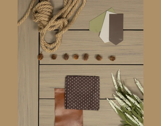 Deckorators Summit Decking in Cliffside Deckorators Summit Decking in Cliffside with rope, brown fabric and brown leather, and other items on it to create a mood board.
