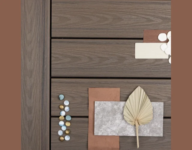 Deckorators Venture Decking in Sandbar Deckorators Decking in Sandbar with pebbles, leaves and other color swatches that create a mood board.