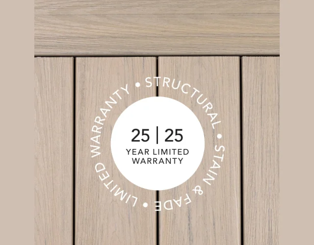 Deckorators® Venture Decking is backed by a 25-year Structural and 25-year Stain & Fade warranty. An circle overlayed on top of Ventures Shoreline decking that displays Deckorators® Venture Decking is backed by a 25-year Structural and 25-year Stain & Fade warranty.